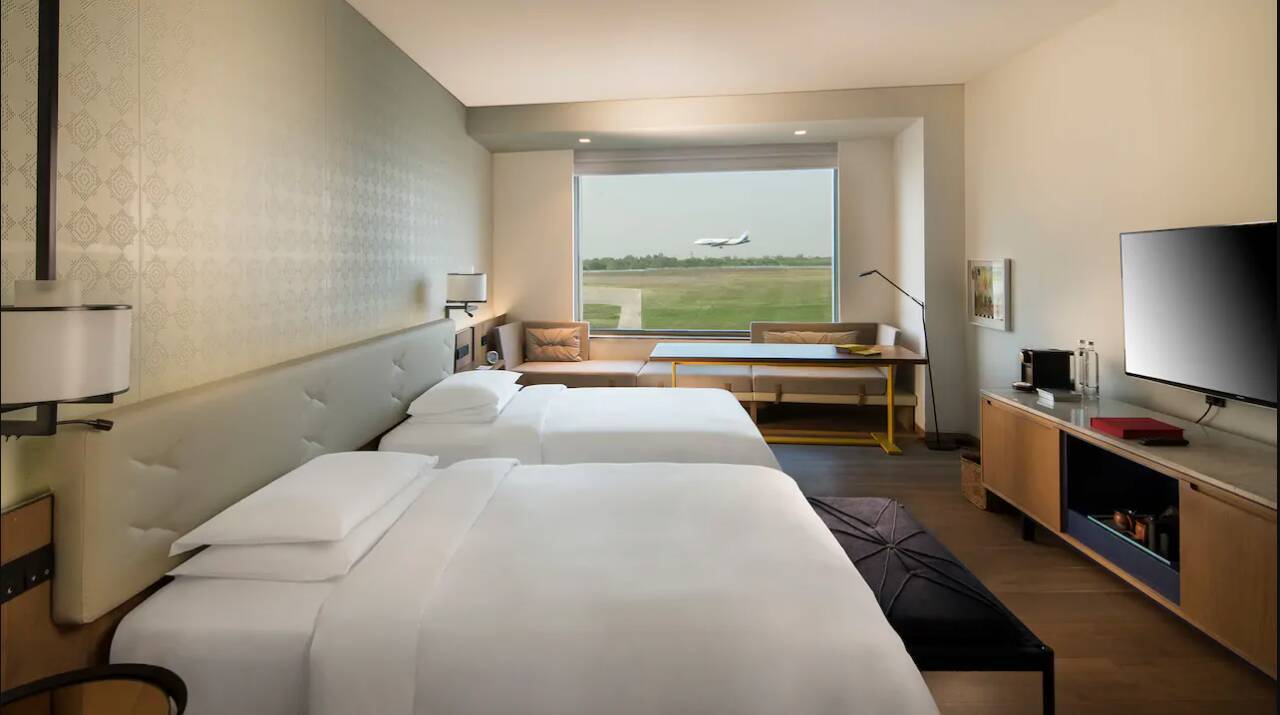 Twin Beds with Runway View Deluxe