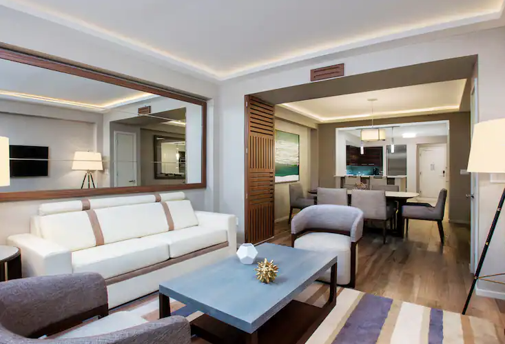 One Bedroom Suite - Poolside View with Two Queen Beds