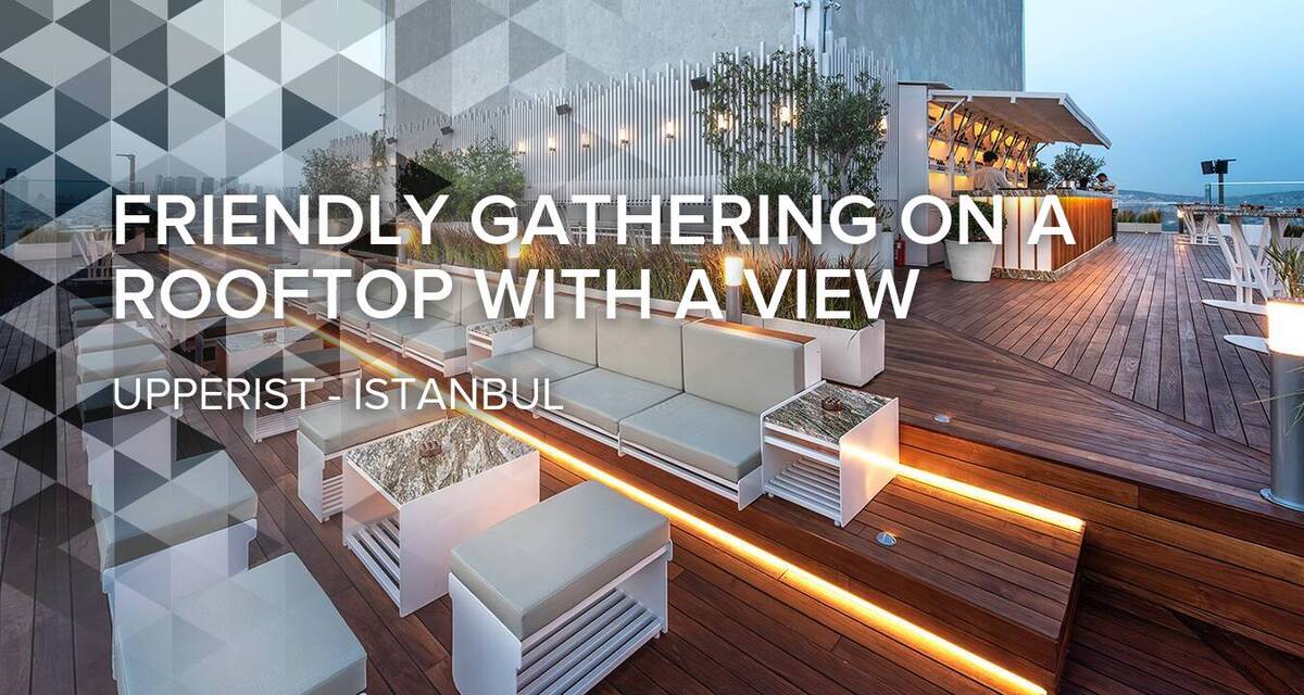 Friendly Gathering on a Rooftop with a View