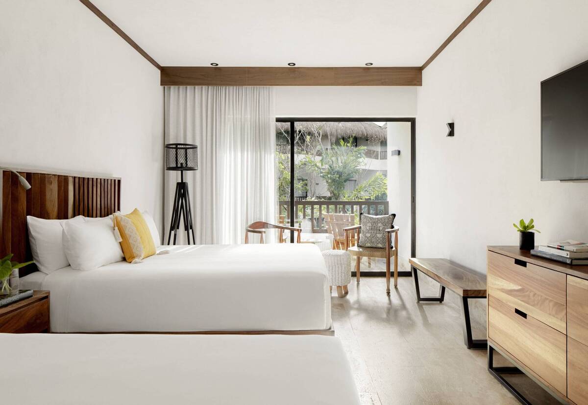 Queen Queen Essential Balcony Room