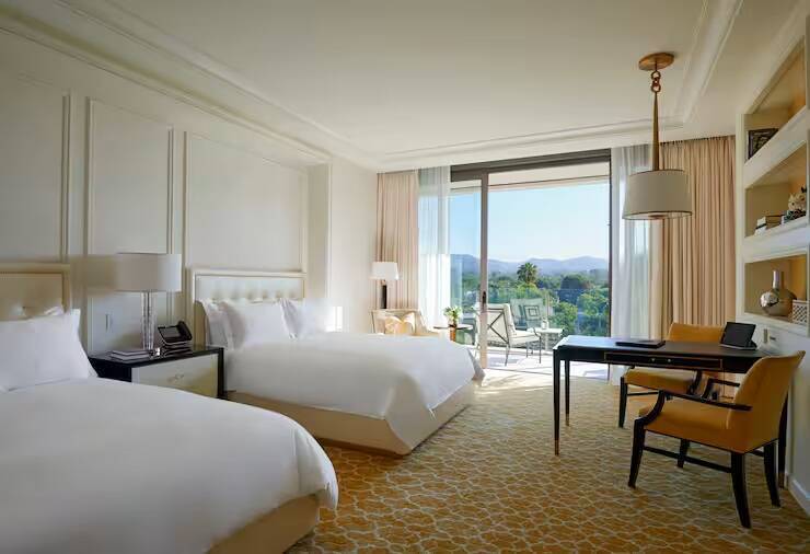 Deluxe Two Queen Roll in Shower/hearing Access