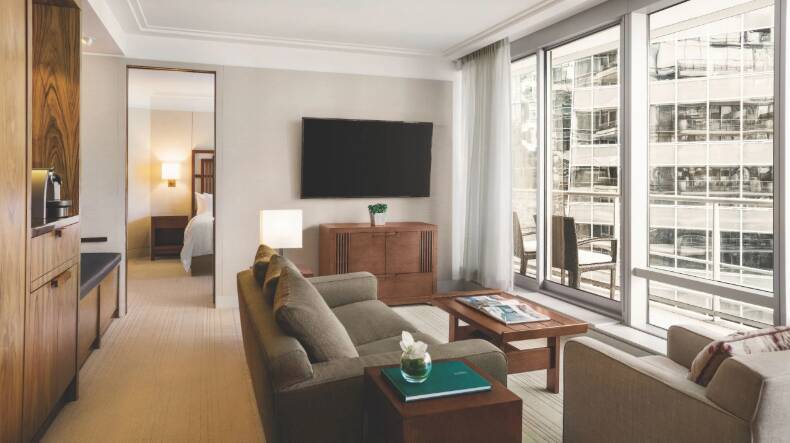 ONE BEDROOM DELUXE SUITE WITH BALCONY AND SOFA BED