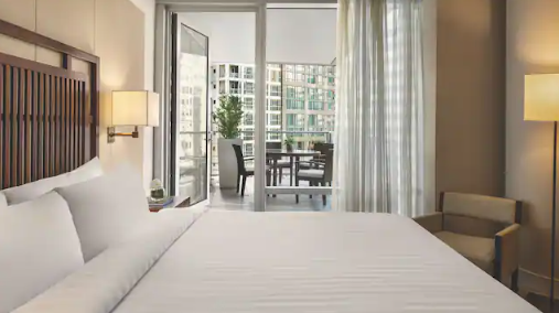 ONE BEDROOM DELUXE SUITE WITH BALCONY AND SOFA BED